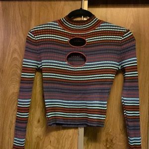 Long sleeve multicolor crop with two chest cut outs. Size M